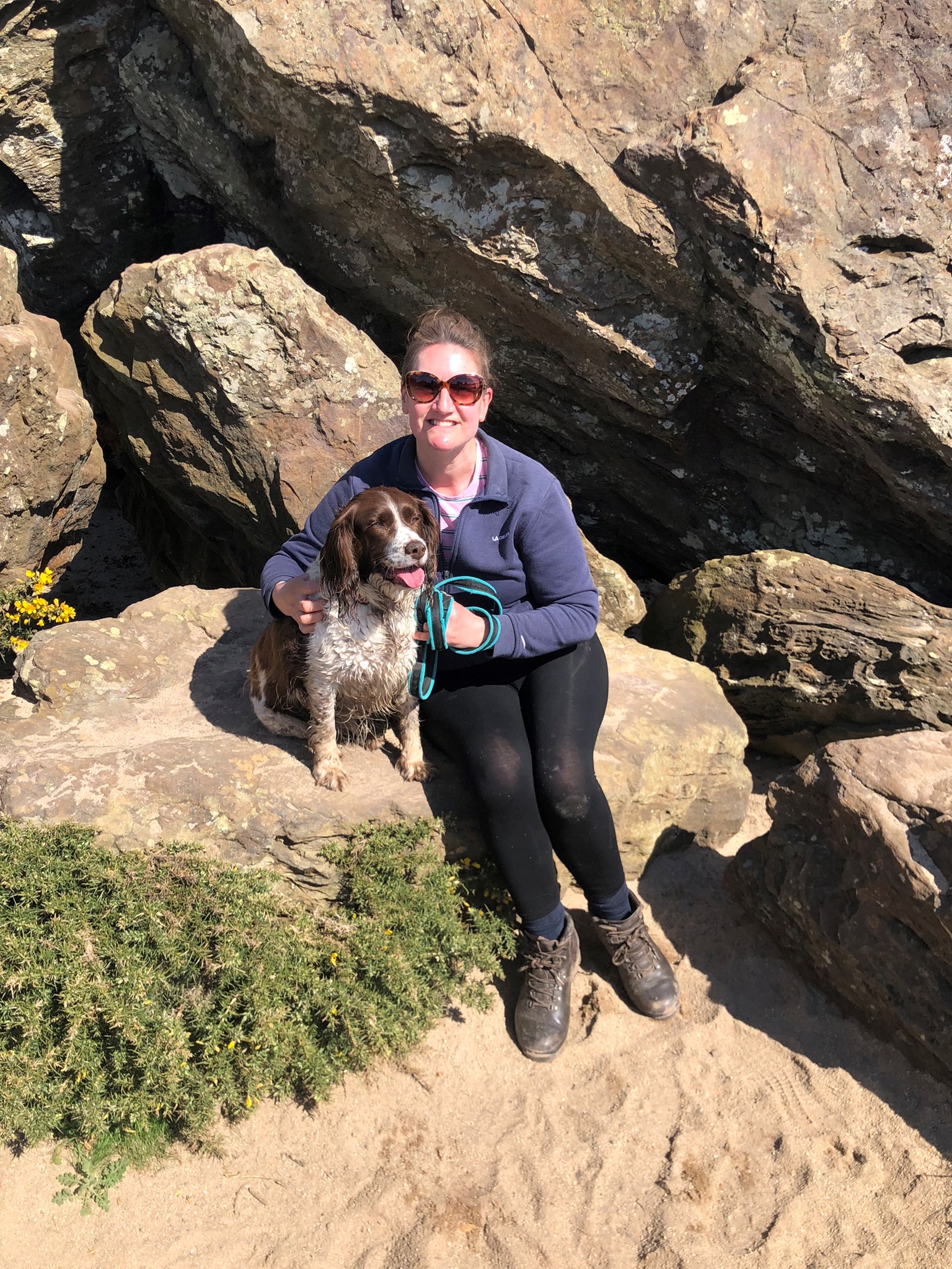 lady with dog on mountain